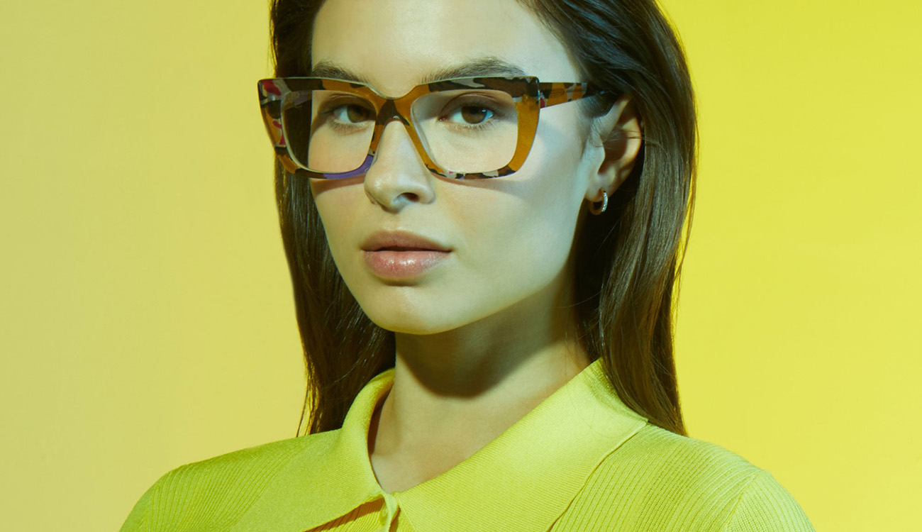 Women with brown framed lenses and yellow overlay